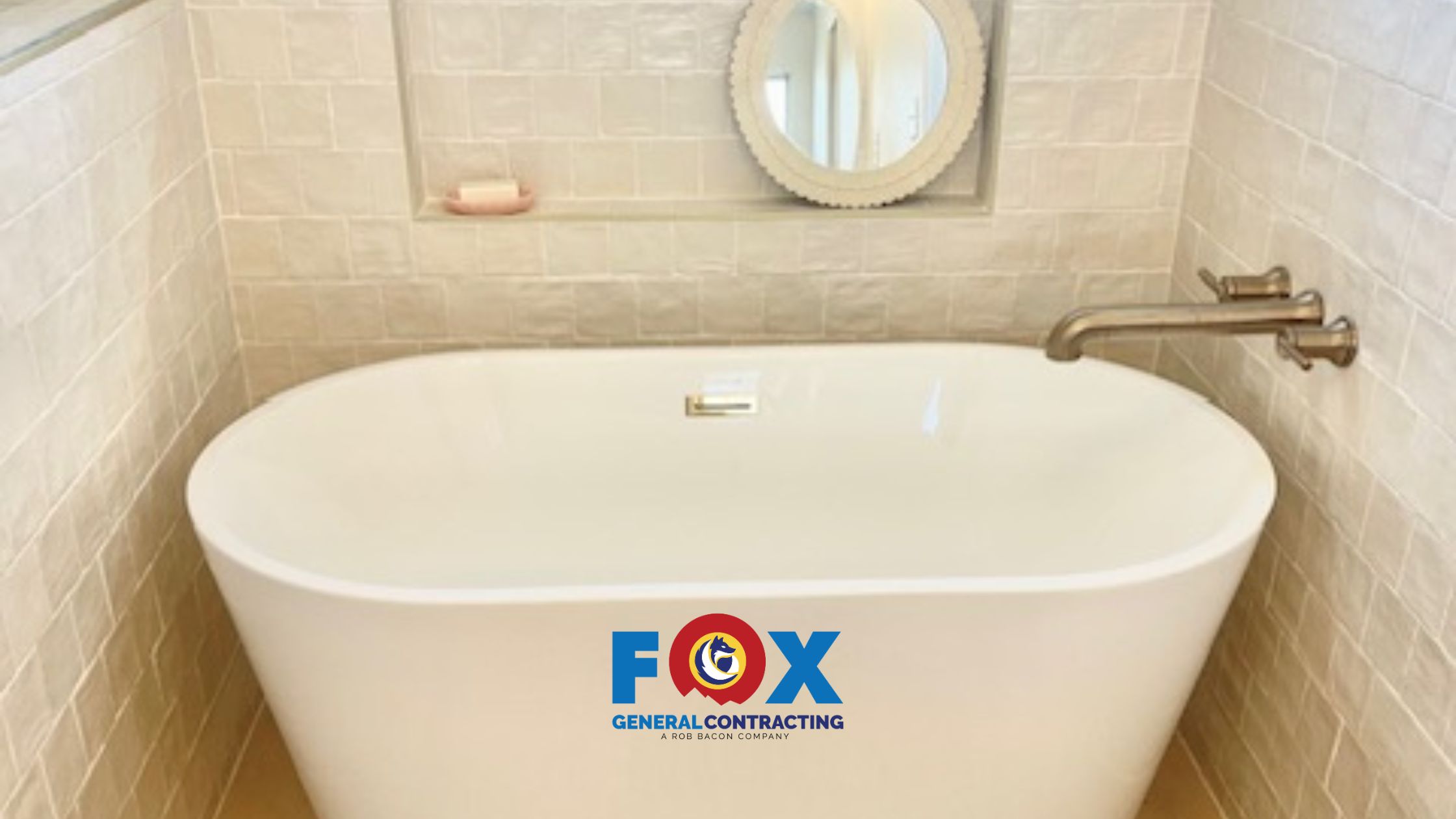 Modern freestanding bathtub in a renovated bathroom by Fox General Contracting on the Eastern Shore
